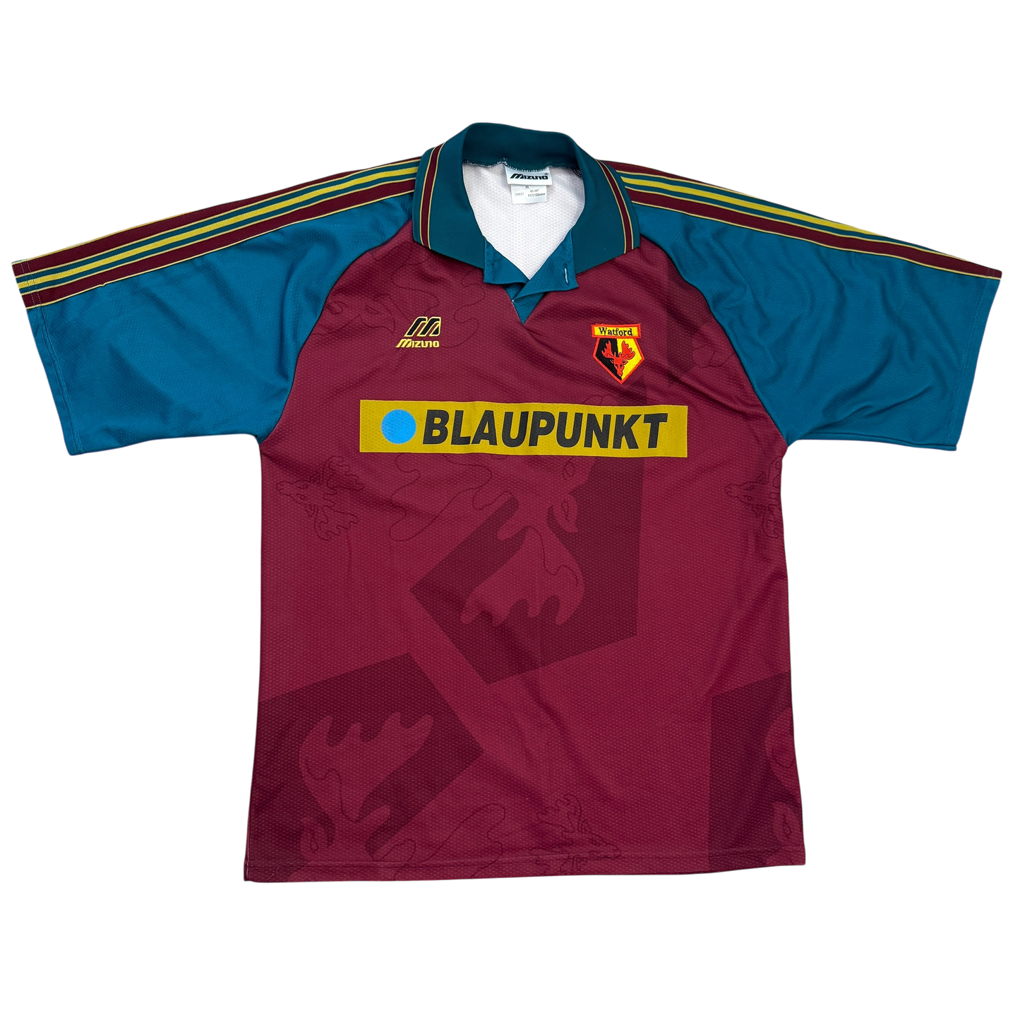 Maroon and blue sports jersey with Blaupunkt logo. The Watford 1995/1996 Away Shirt front