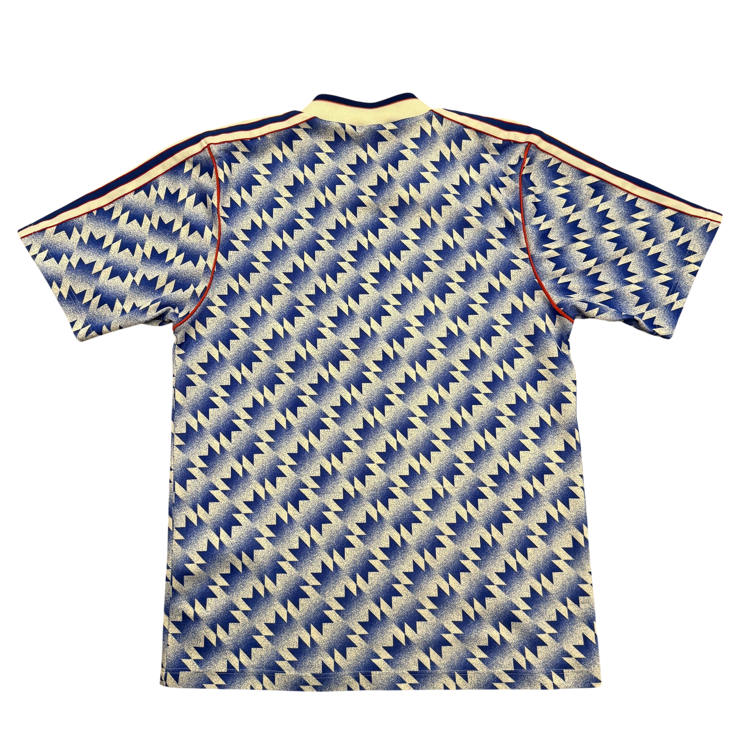 Shirt with a blue and beige geometric pattern on a white background