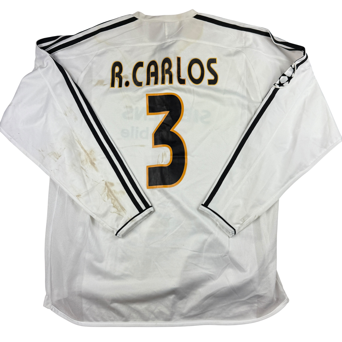 White Real Madrid jersey with 'R.Carlos' and number '3' on a white background