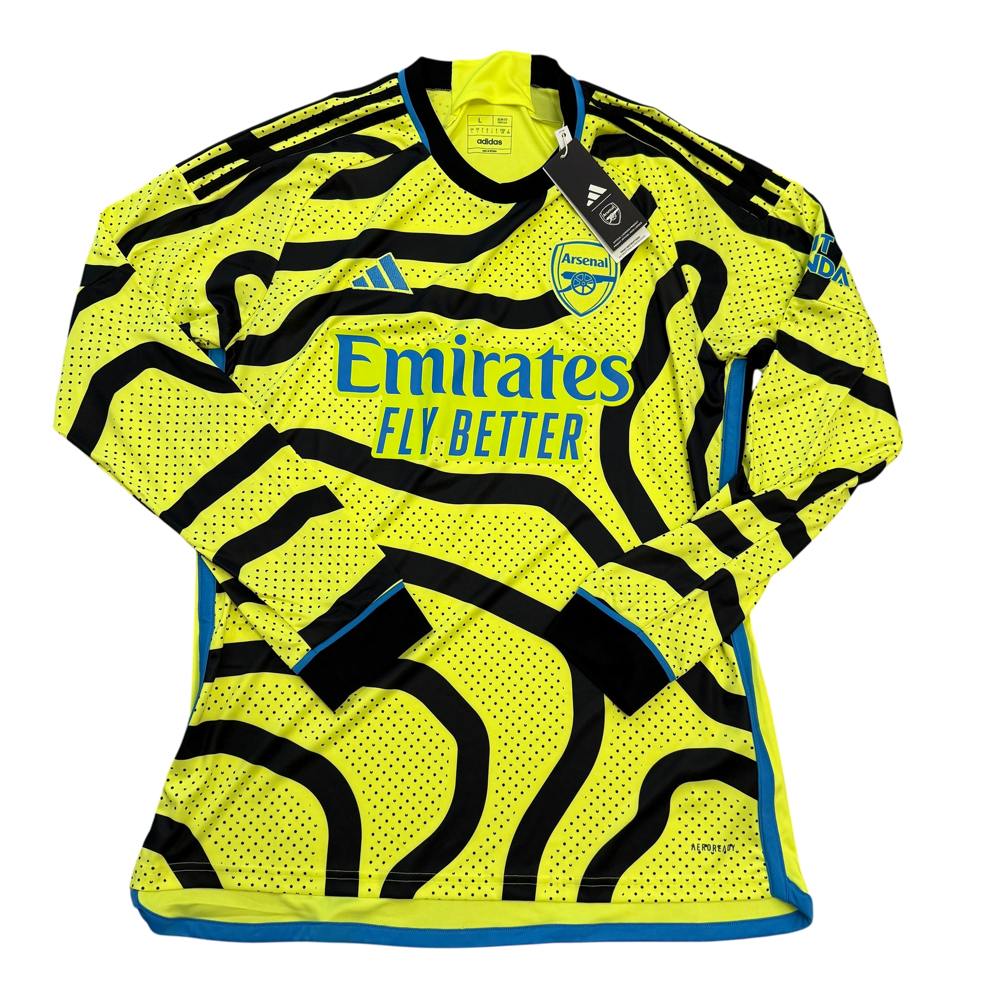 Arsenal away shirt 2023/2024 - Yellow sports jersey with black patterns and branding on a white background