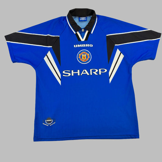 Manchester United 1996-1997-1998 Third Shirt - a blue shirt with central SHARP sponor and Manchester United badge