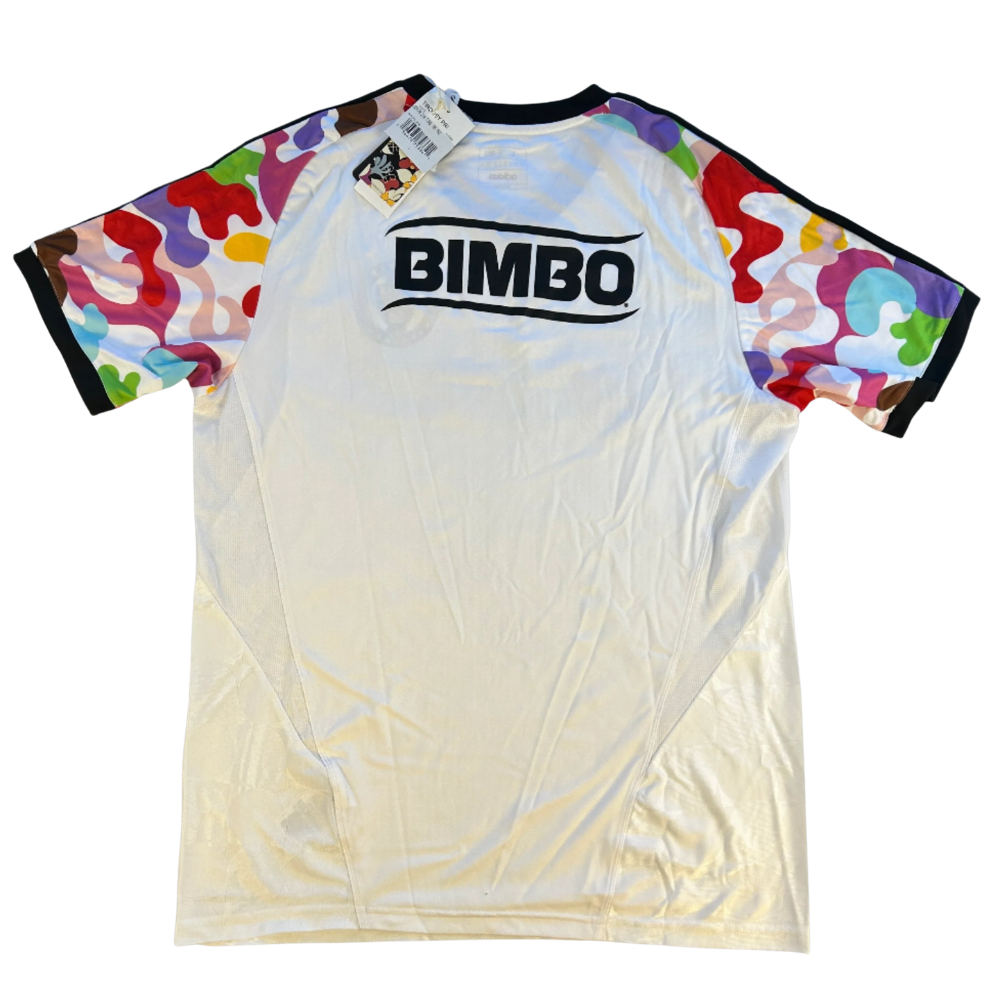 Colorful sports jersey with 'BIMBO' branding on a white background back