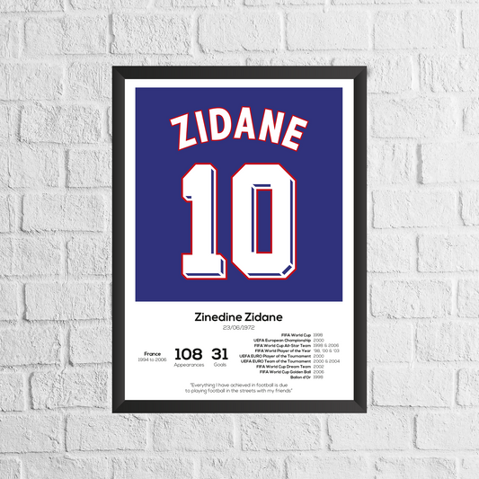 Framed poster of Zinedine Zidane with number 10 on a white brick wall