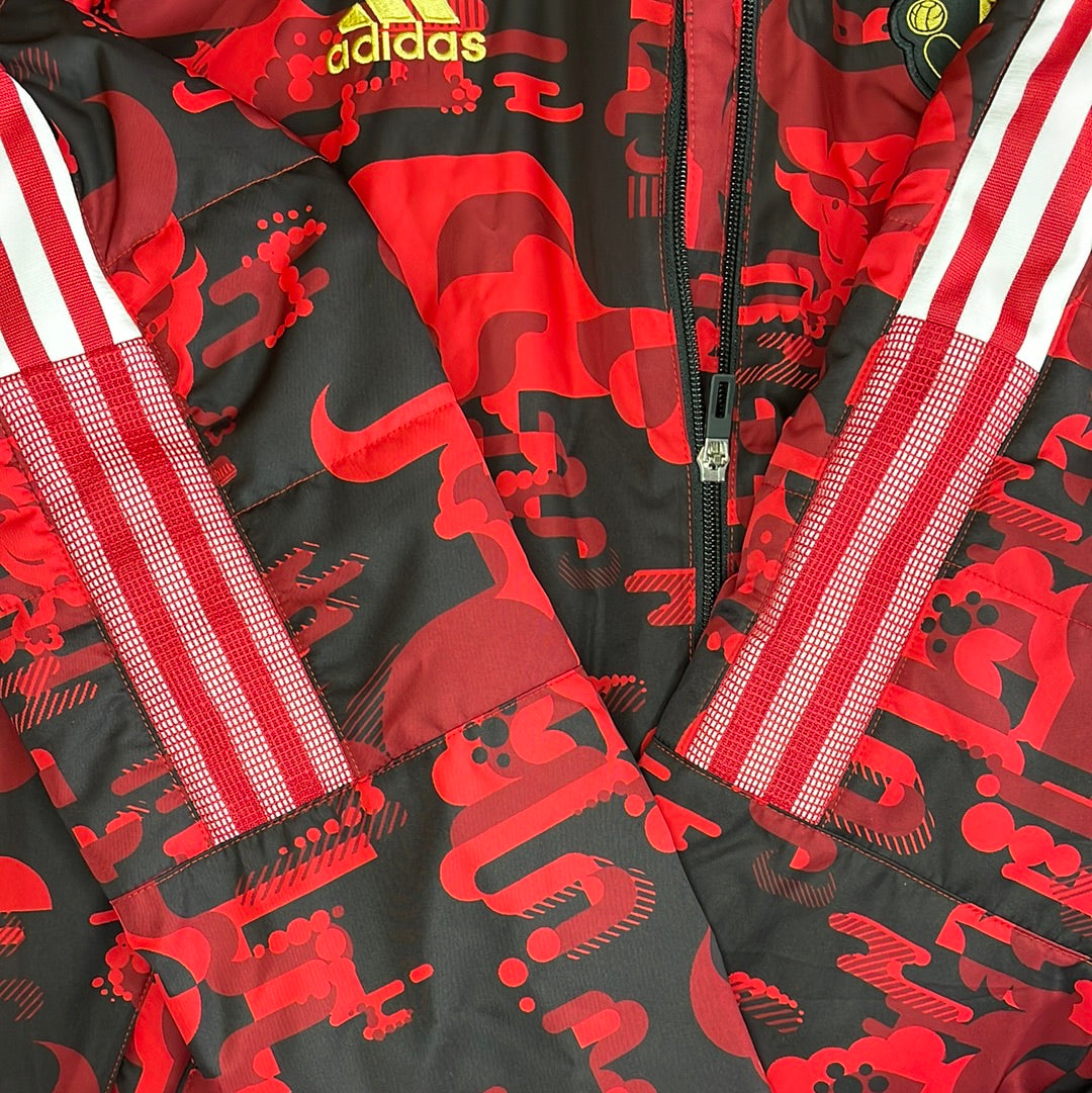 Adidas 3 stripes go into a mesh covering at the bottom