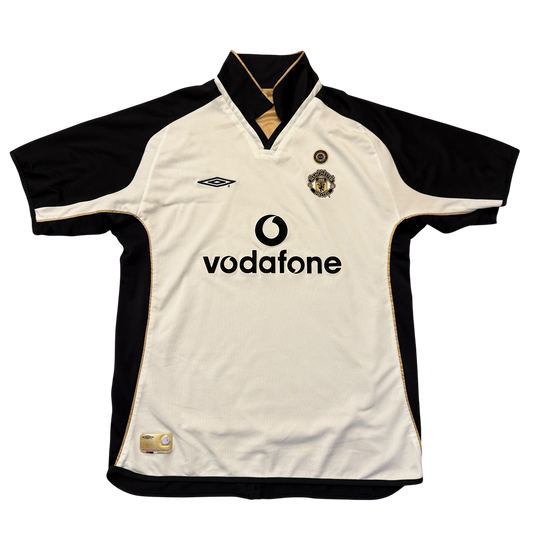 White and black Manchester United 2001-2002 Third  jersey with Vodafone logo on a white background