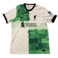 Soccer jersey with green and white design, featuring logos and text on a white background - Liverpool 2023/2024 Away Shirt
