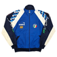 Blue and navy Italy 1990 football  jacket with checkered patterns and logos on a white background