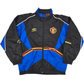 19990s Black and blue jacket with Manchester United logo and Umbro branding on a white background