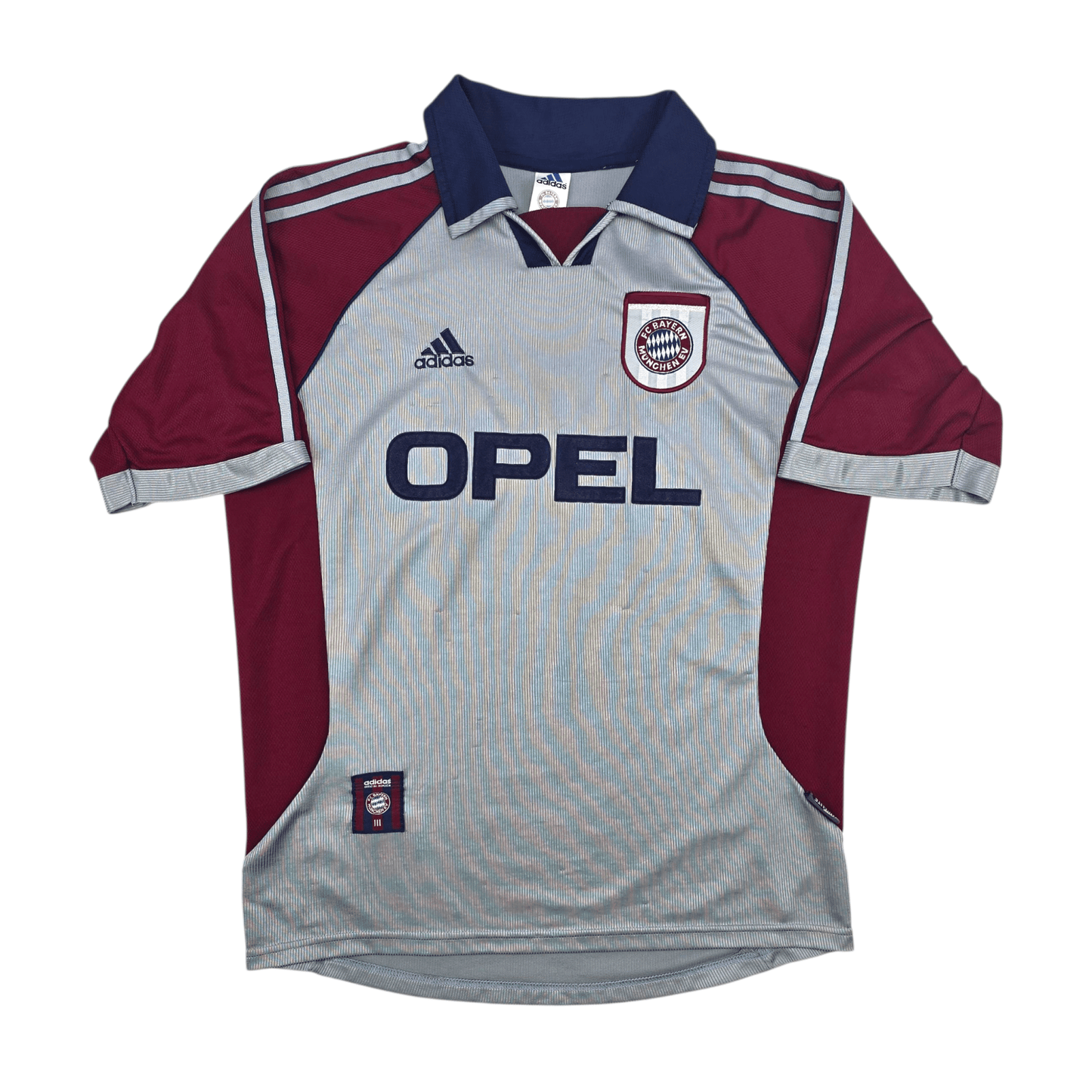 Grey Bayern Munich 1998 away jersey with red sleeves and Adidas and Opel logos on a white background
