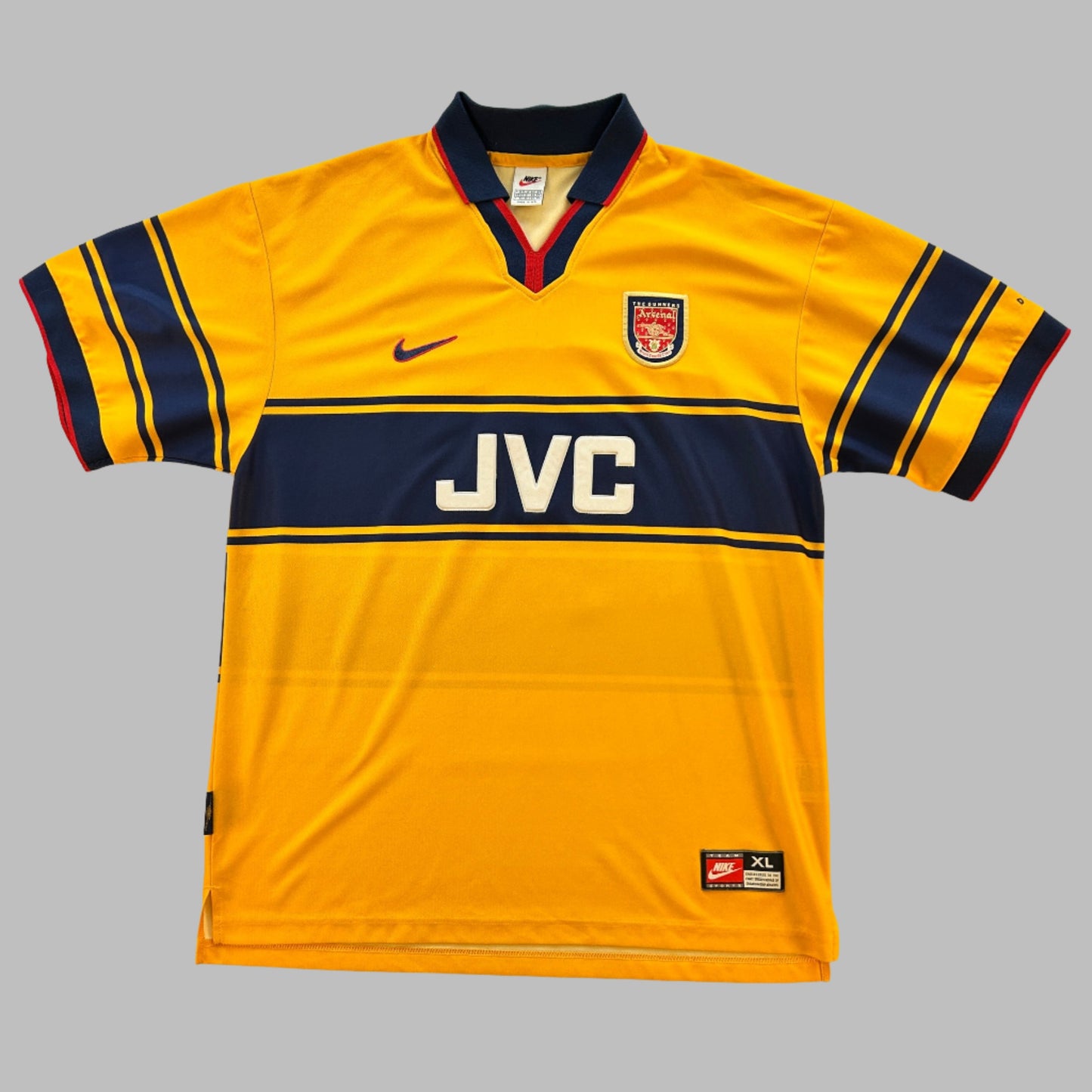 Arsenal 1997/1998 Away Shirt - A yellow shirt with blue stripe across the middle and on the sleeves. 