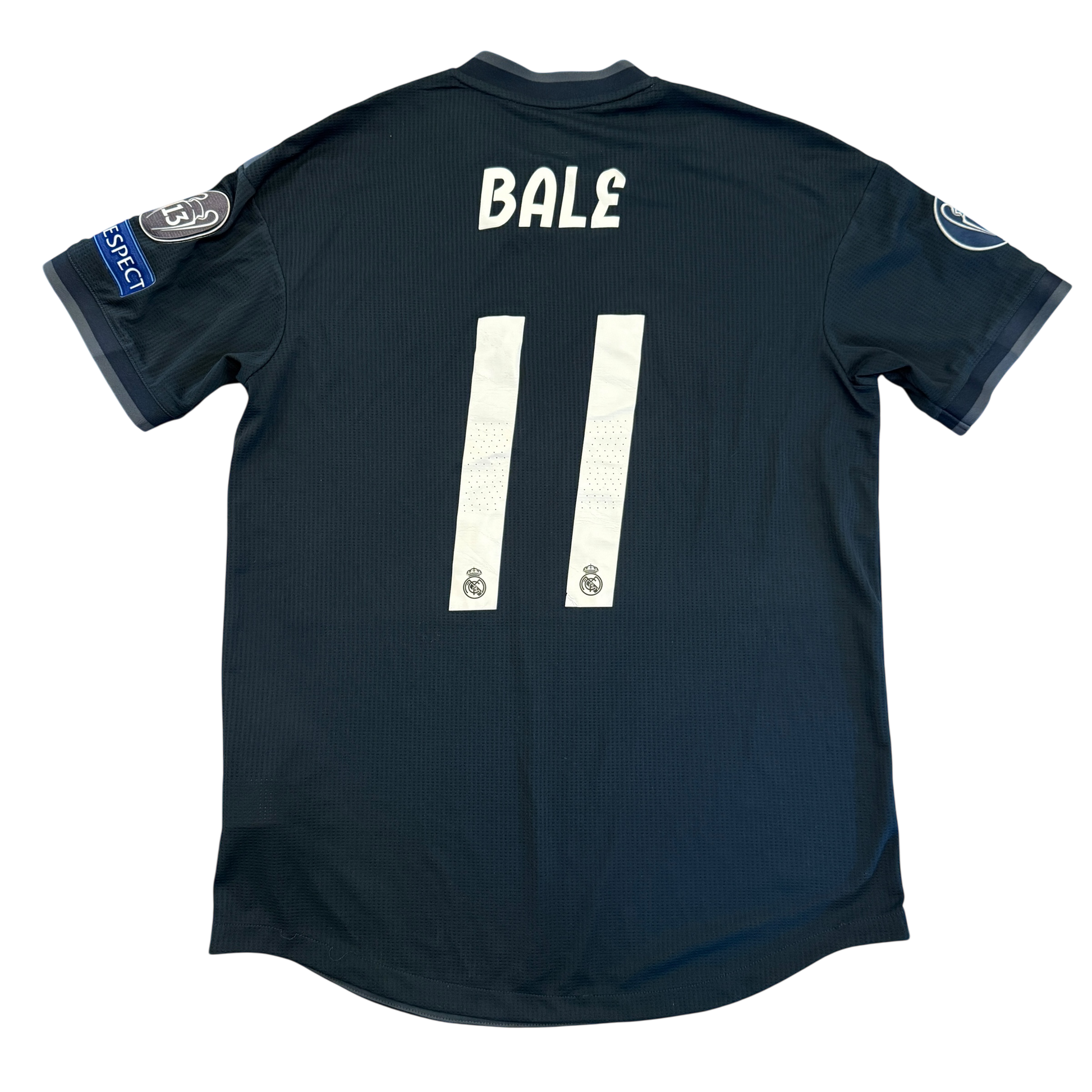 Navy blue sports jersey with 'BALE' and number '11' on a white background