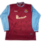 Maroon sports jersey with blue sleeves, signed by multiple people, on a white background.