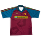 Maroon and blue sports jersey with Blaupunkt logo. The Watford 1995/1996 Away Shirt front