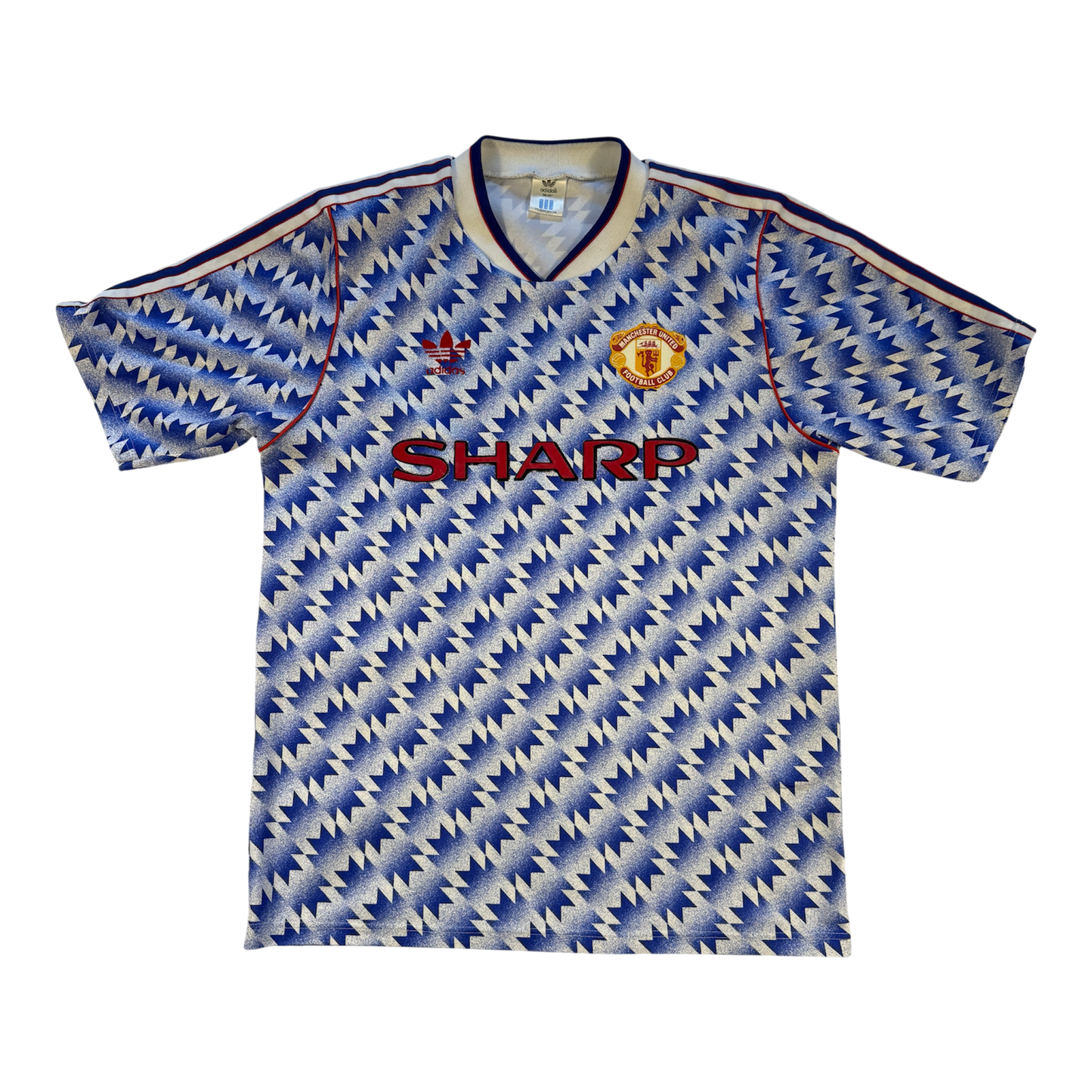Vintage Manchester United Manchester United 1990 Away Shirt with a patterned design on a white background
