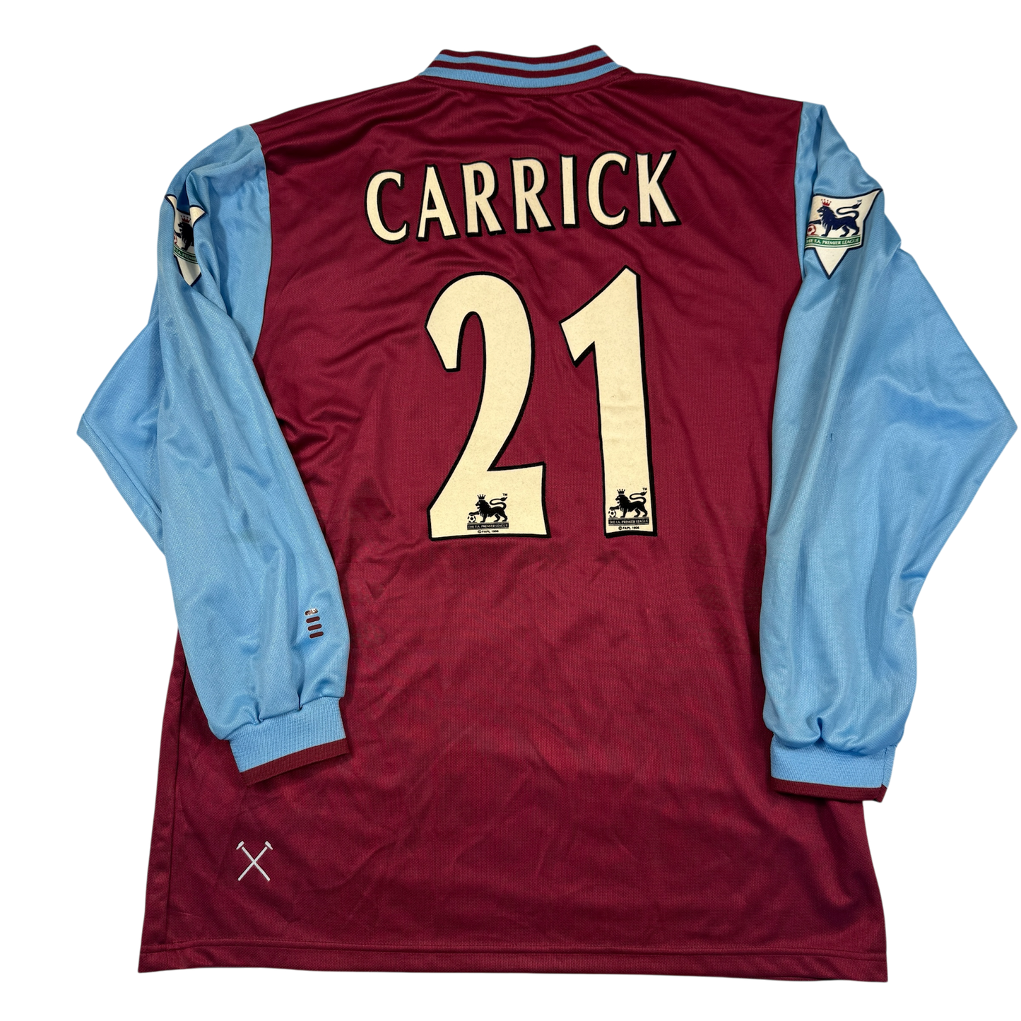 Maroon sports jersey with 'Carrick 21' on a white background