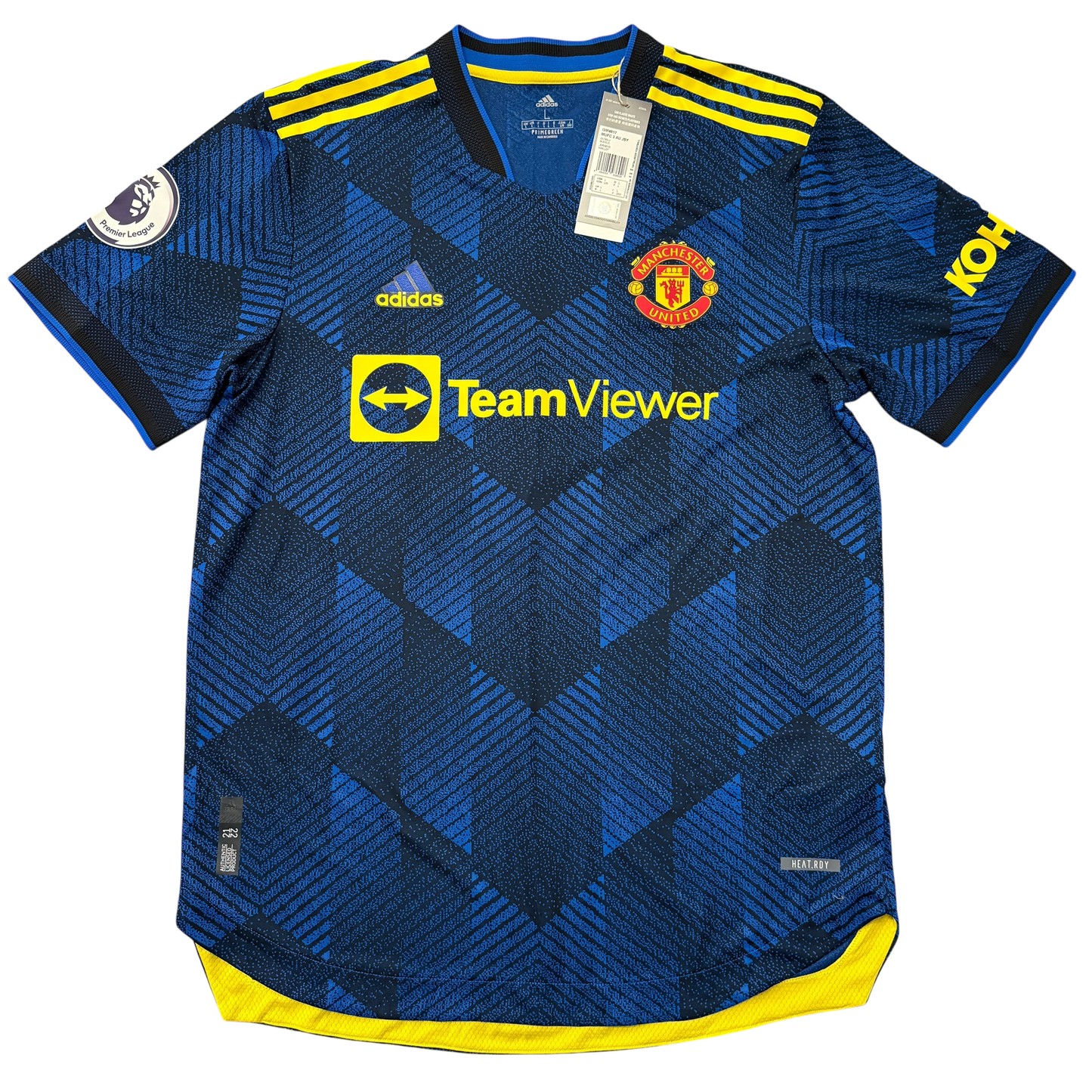 Blue Manchester United 2021/2022 HEAT.RDY Thirdjersey with yellow accents and branding on a white background