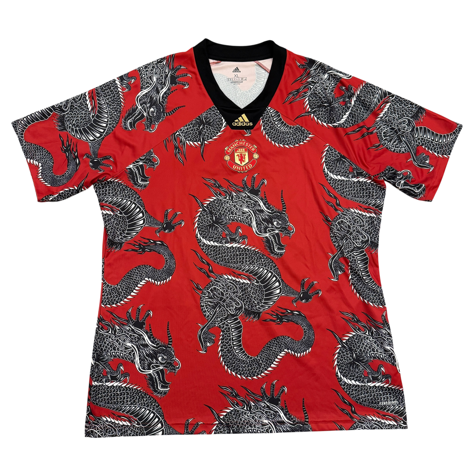 Red sports jersey with dragon pattern and Adidas logo on a white background - Manchester United 2020 Chinese New Year Shirt