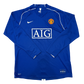Blue 2008 goalkeeper jersey with AIG logo and Manchester United emblem on a white background