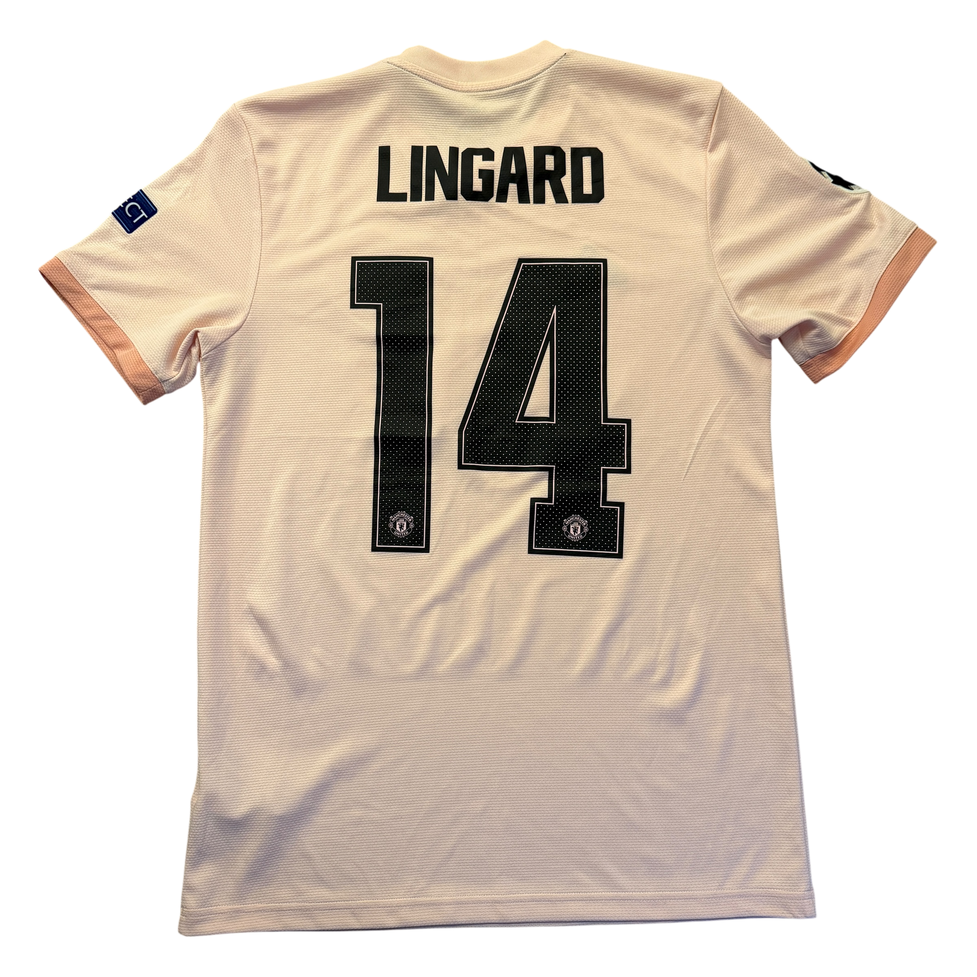 pink Manchester United jersey with 'LINGARD 14' printed on the back against a white background