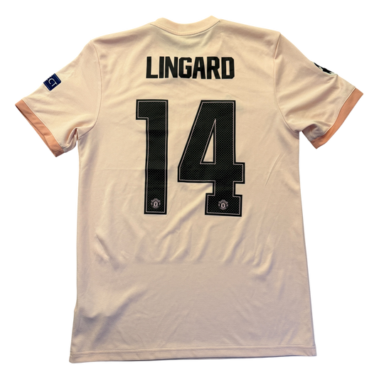 pink Manchester United jersey with 'LINGARD 14' printed on the back against a white background