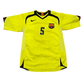 Yellow soccer jersey with number 5 and Barcelona logo - the Barcelona 2005-2006 Away Shirt