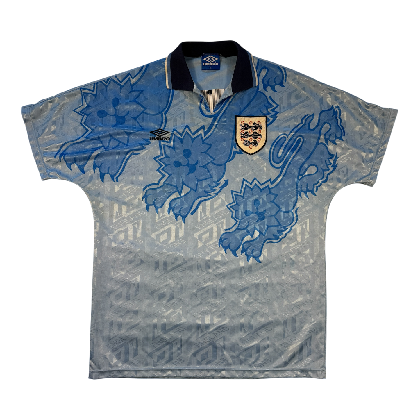 Blue England 1992 Player Issue Third jersey with blue patterns and a logo on a white background