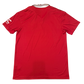 Red sports jersey with a brand logo on the sleeve against a white background