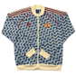 Blue and white patterned Manchester United Class Of 92 Jacket with Adidas logo on a white background