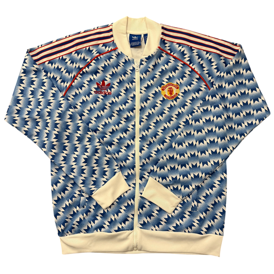 Blue and white patterned Manchester United Class Of 92 Jacket with Adidas logo on a white background