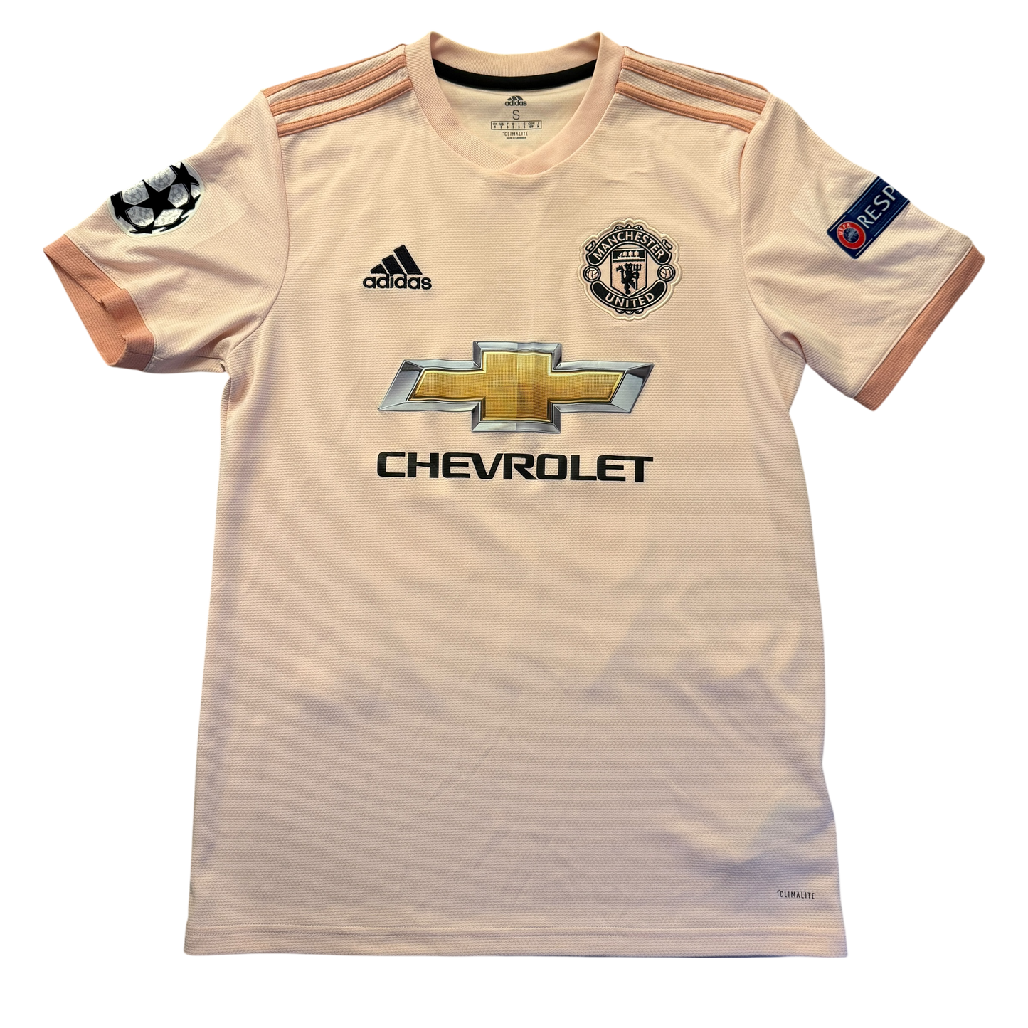 Pink Manchester United 2018/2019 third shirt with Manchester United and Adidas logos on a white background. The shirt has a large Chevrolet logo on the front
