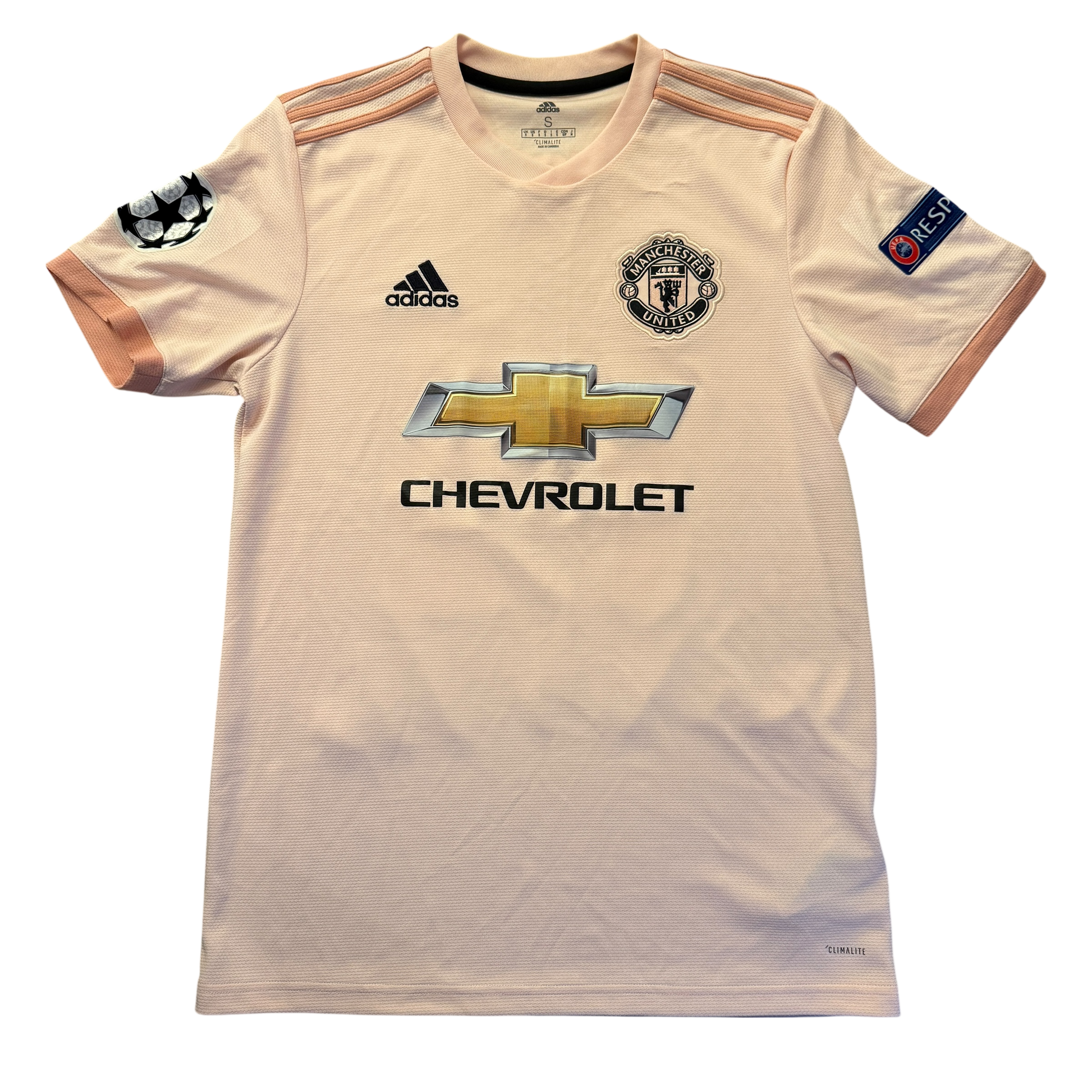 Pink Manchester United 2018/2019 third shirt with Manchester United and Adidas logos on a white background. The shirt has a large Chevrolet logo on the front
