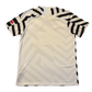 White sports jersey with black zigzag patterns on sleeves and chest, on a white background