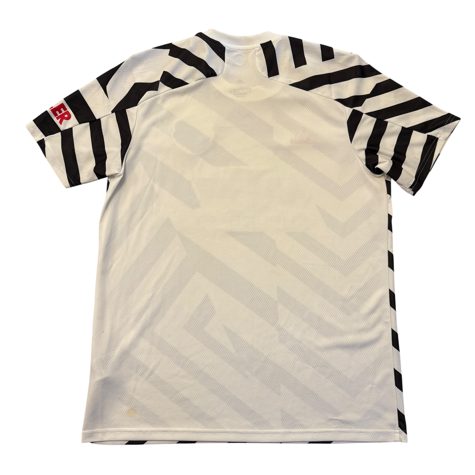 White sports jersey with black zigzag patterns on sleeves and chest, on a white background