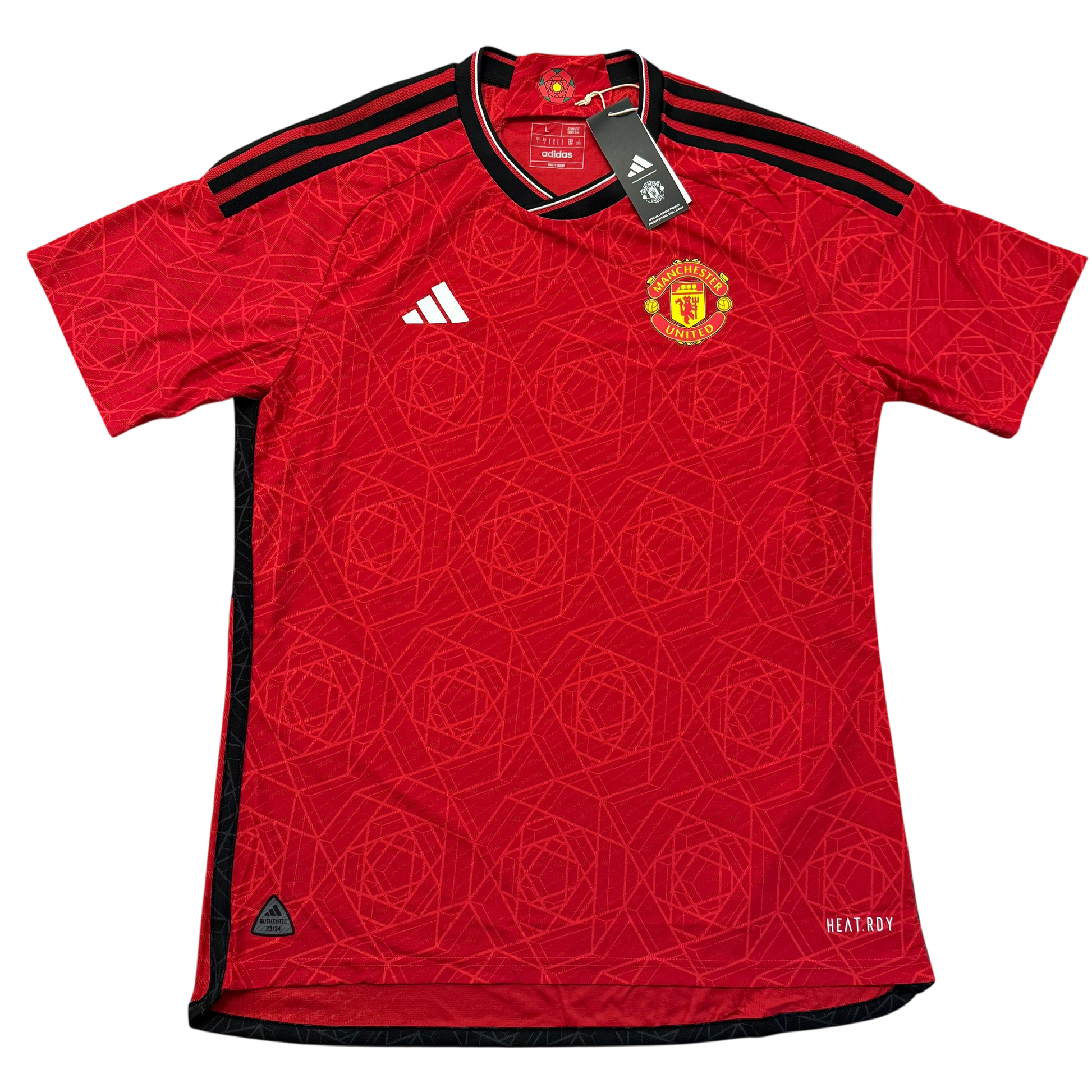 Red Manchester United 2023-2024 Player Issue Home jersey with Adidas and Manchester United logos on a white background
