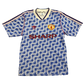 Vintage Manchester United football shirt with Adidas logo and 'Sharp' sponsorship on a white background - Manchester United 1990 Away Shirt 