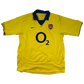 Yellow Arsenal 2003-2004 Away jersey with blue collar and 'O2' logo on a white background