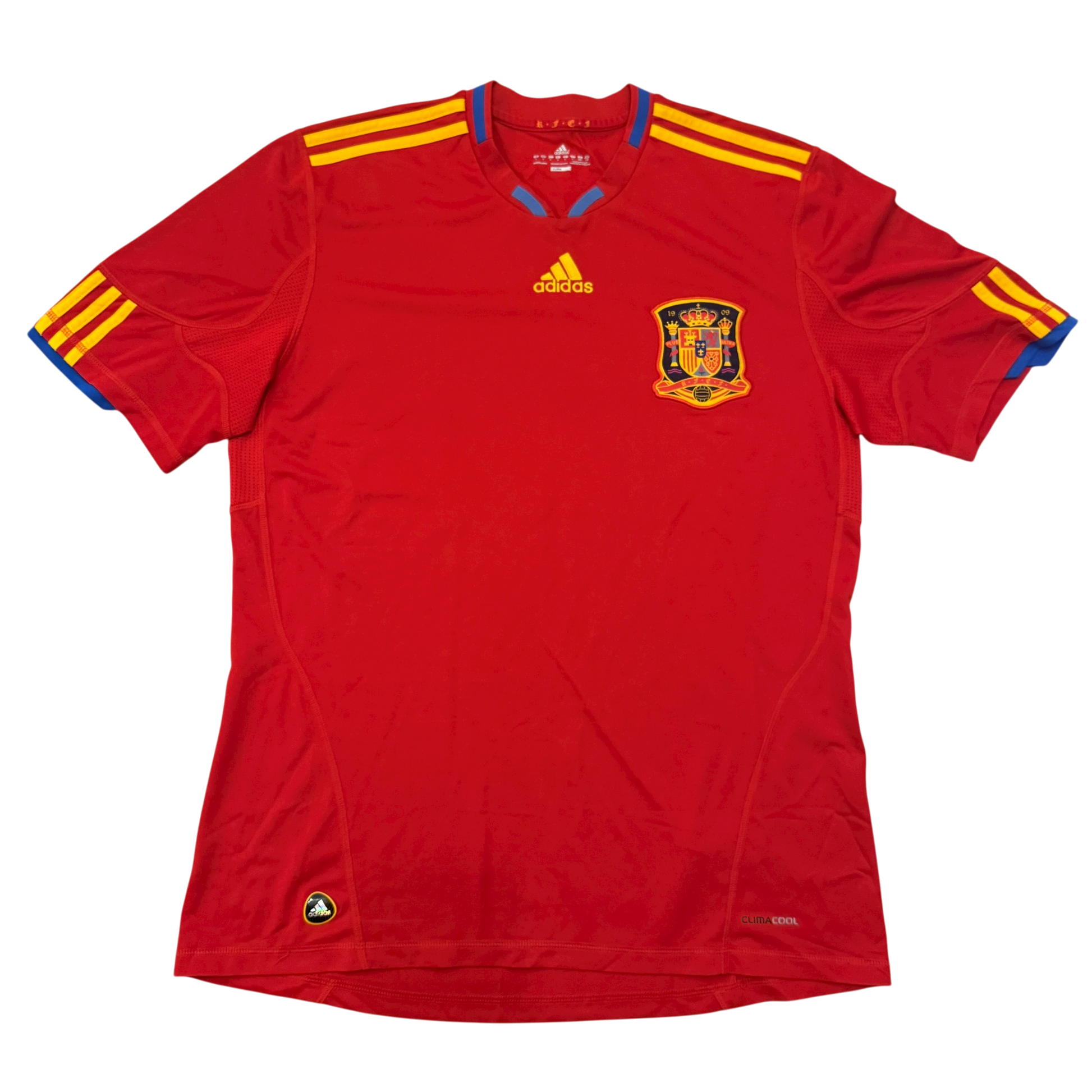 Red sports jersey with yellow stripes and a logo on a white background -the Spain 2010 Home Shirt in Climacool