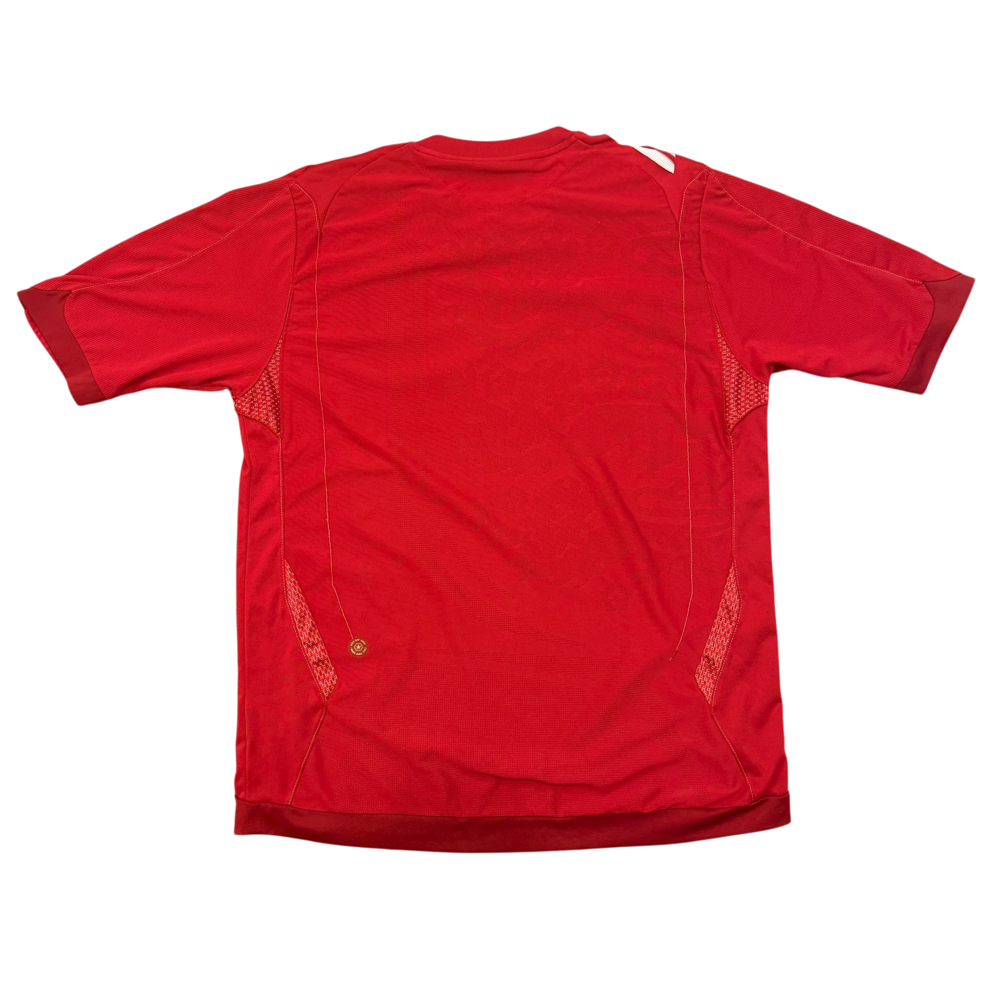 The back of the England 2006 Away Shirt - an red jersey with 3 lions in the material 