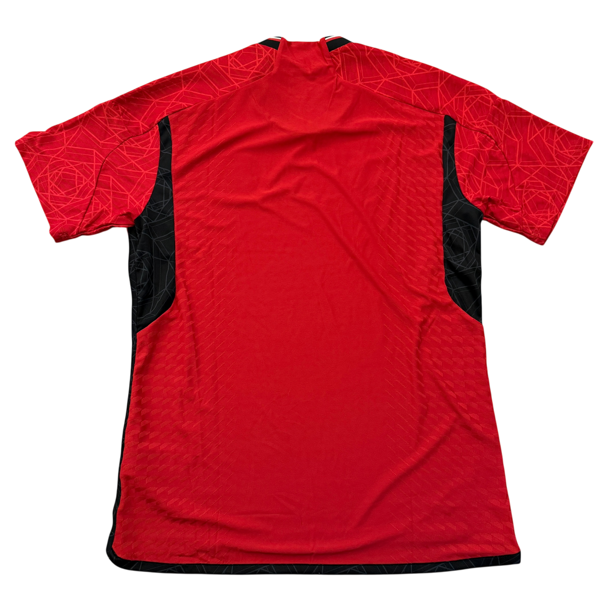 Red sports jersey with black accents on a white background