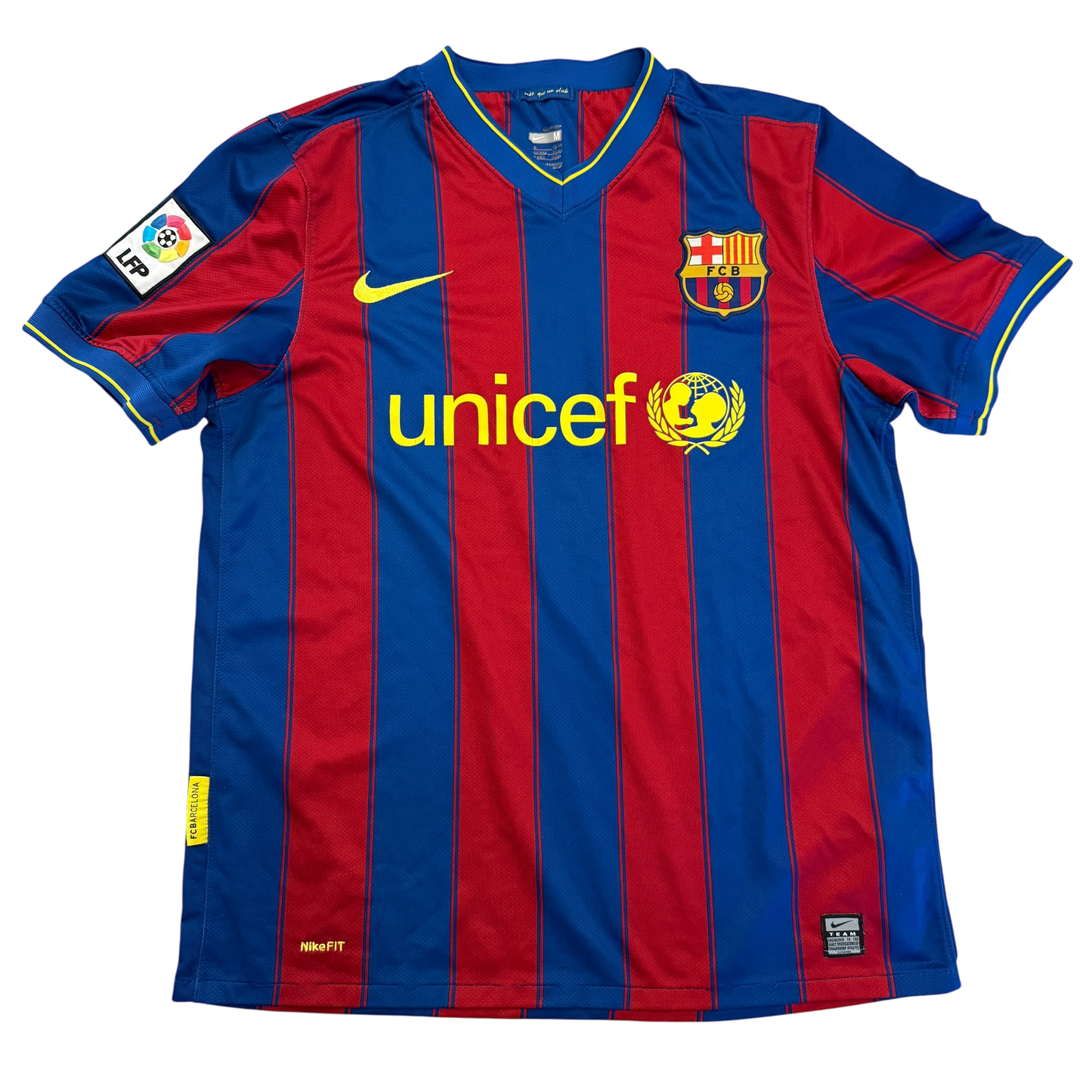 Red and blue striped sports jersey with Unicef logo on a white background - Barcelona 2009-2010 Home Shirt 