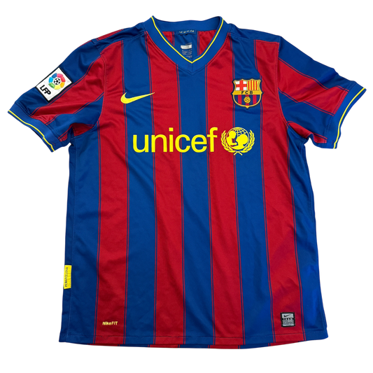 Red and blue striped sports jersey with Unicef logo on a white background - Barcelona 2009-2010 Home Shirt 