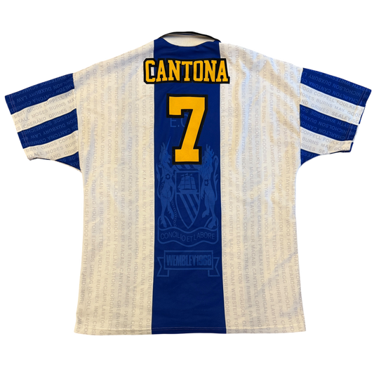 Soccer jersey with 'Cantona' and number '7' on a white background - the Manchester United 1994/1995/1996 Third Shirt in Extra Large 