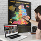 Person interacting with a colorful rugby stadium map on a desk with a laptop.