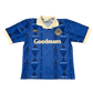 Blue Portsmouth 1993/1994 Home Shirt with 'Goodmans' branding on a white background