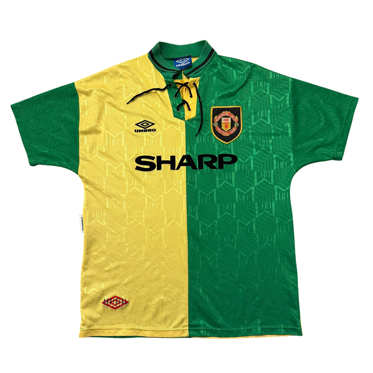 Green and yellow Manchester United 1992-1993-1994 Third jersey with Manchester United logo and Umbro branding on a white background