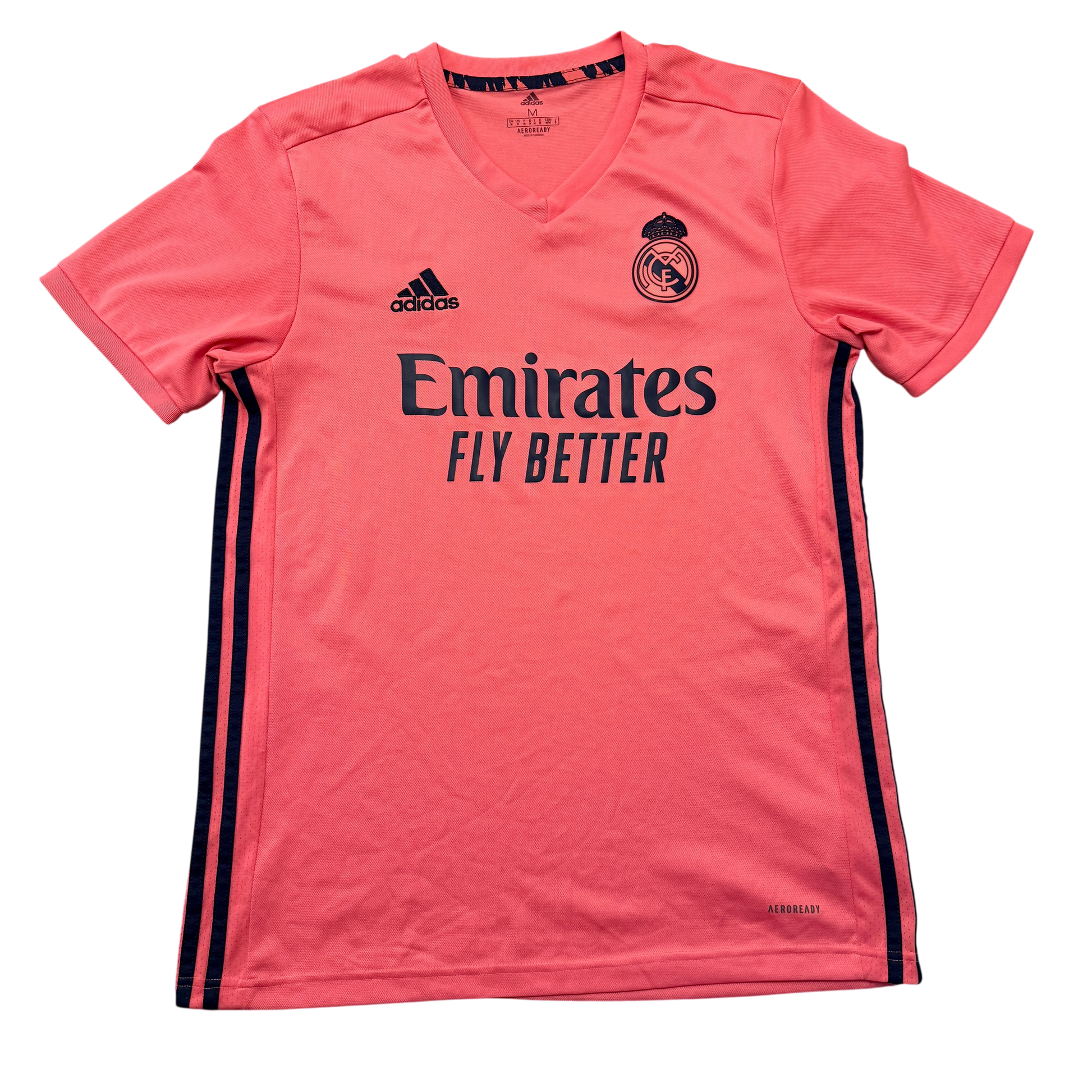Pink Real Madrid 2020-2021 Away jersey with Adidas and Real Madrid logos on a white background