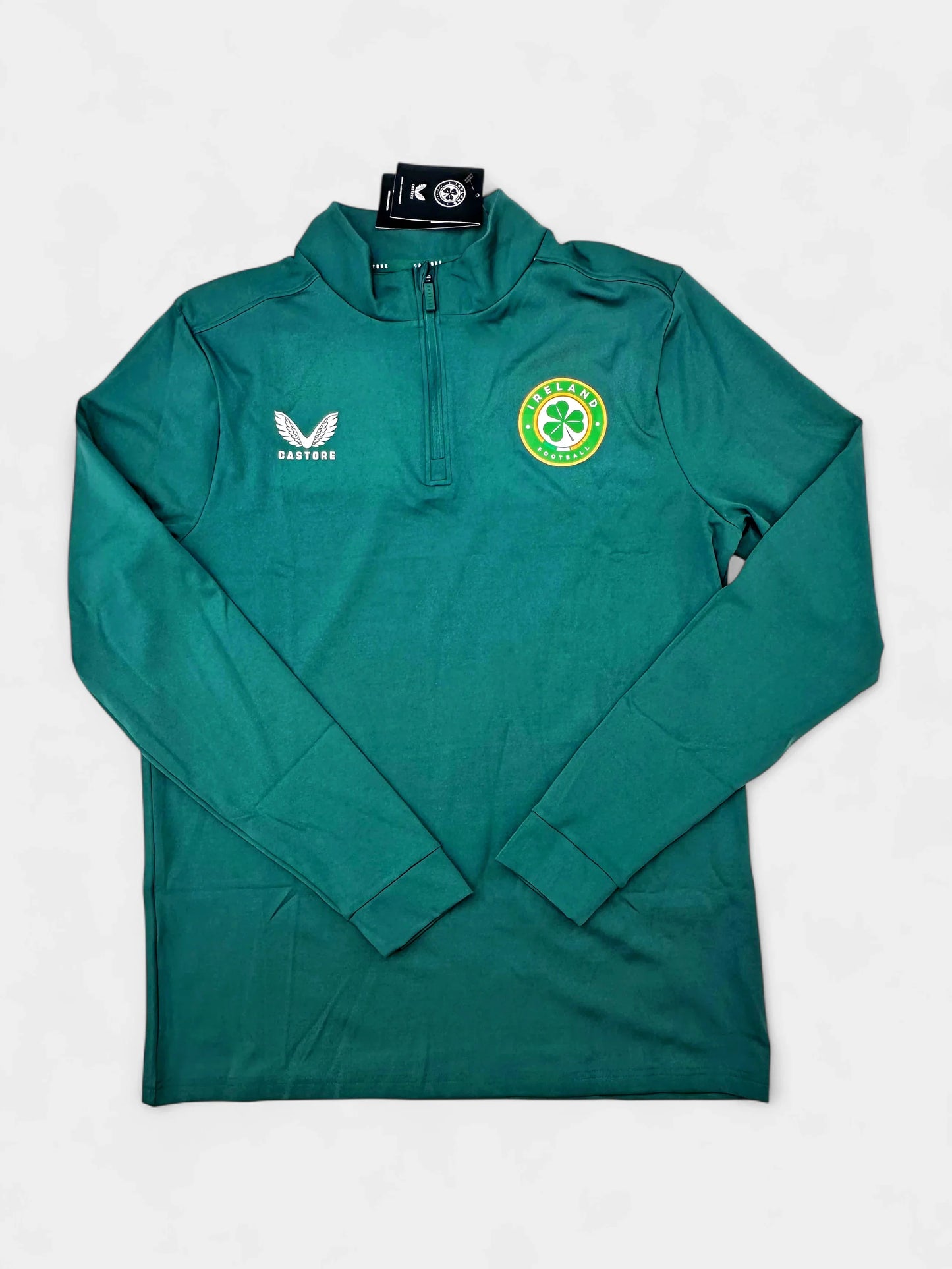 Green Ireland 2023 1/4 Zip Drill jacket with a logo on a white background