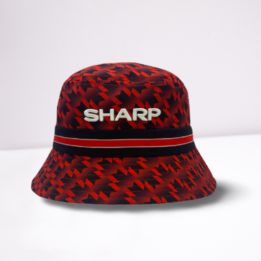 Red and black patterned bucket hat with 'SHARP' text on a white background