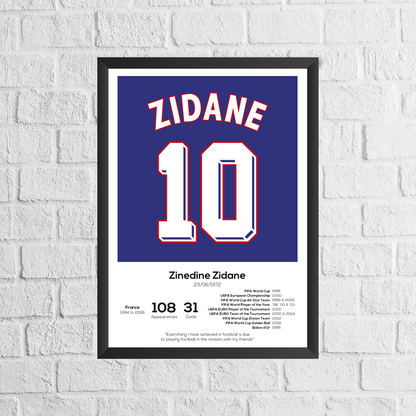 Framed poster of Zinedine Zidane with number 10 on a white brick wall