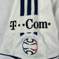 .T.. Com player issue sleeve patch